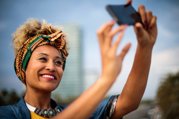 istock Smiling woman making selfie. 961939440