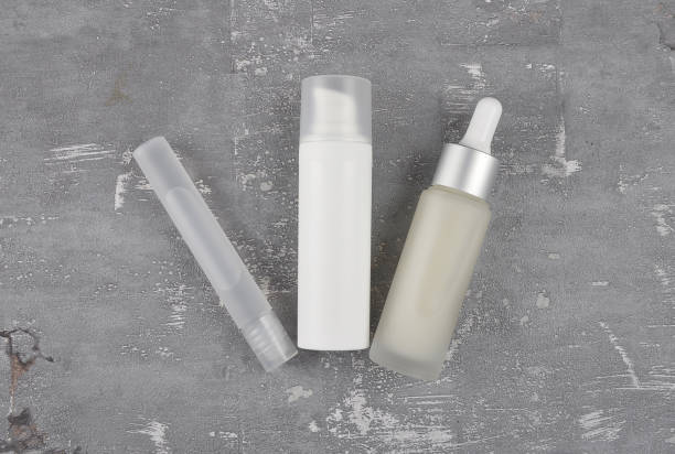 istock Cosmetic products on concrete 961941024