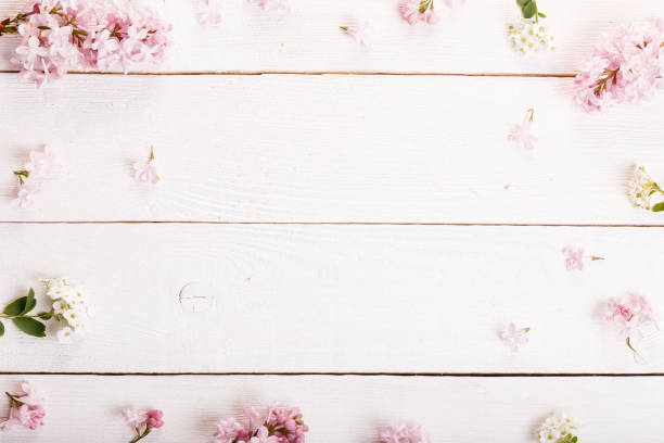 istock Festive flower composition on the white background. Overhead view 961946342