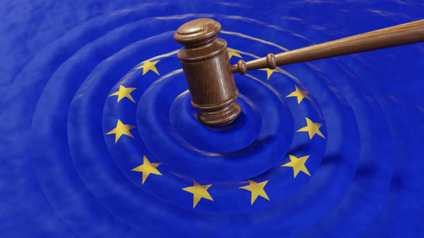 EU judge hammer sentencing European Union GDPR fine Judge hammer or gavel hitting EU flag. Concept of law, GDPR breach, tax fraud, monetary penalty, corruption general data protection regulation photos stock pictures, royalty-free photos & images