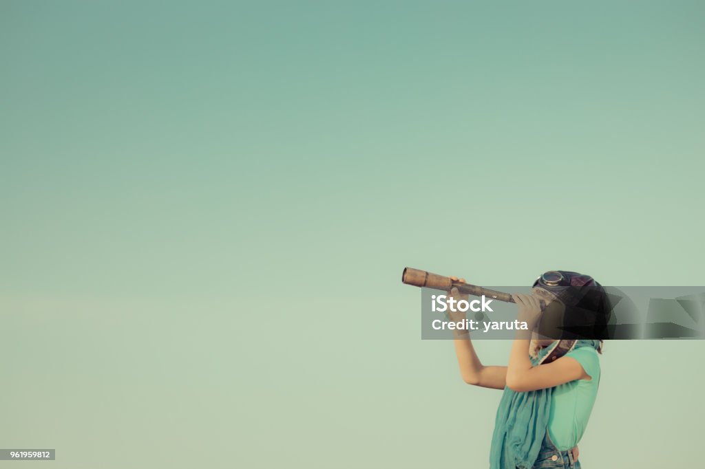 Happy kid playing outdoors Happy kid playing outdoors. Travel and adventure concept Child Stock Photo