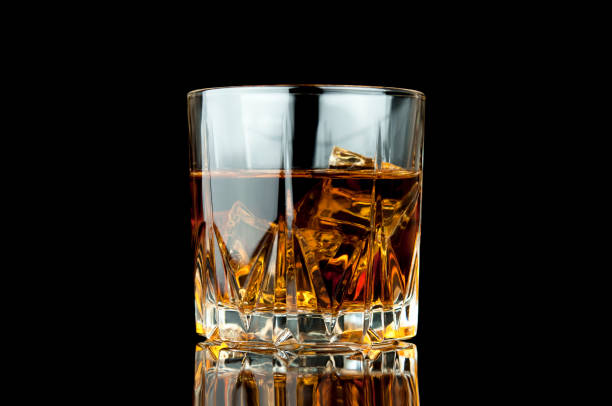 istock Glass of whiskey and ice. 961960706