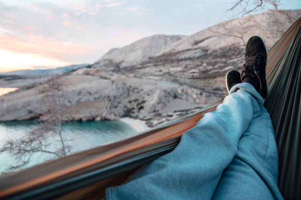 istock Hammock by the sea point of view 961963258