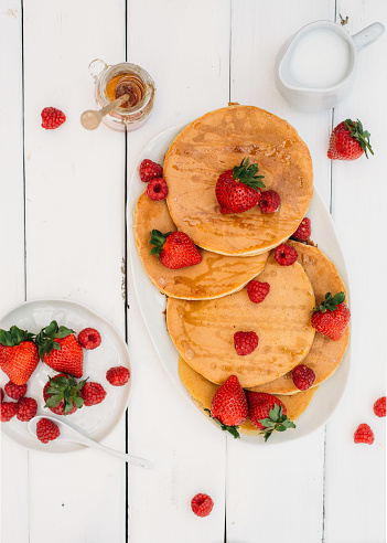 Delicious breakfast with pancakes and berries. Morning concept