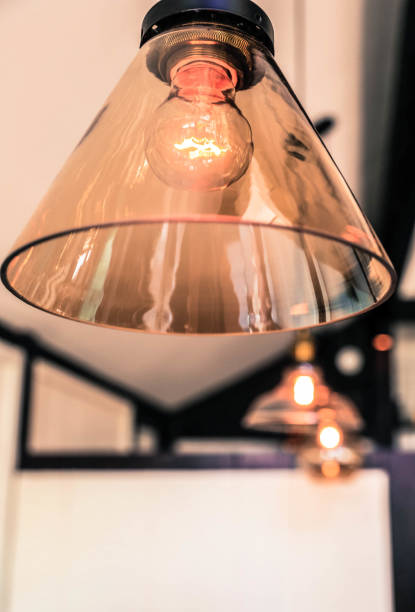 istock Row of glowing electric lamps 961967082