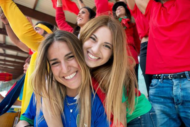 istock Smiling Supporter Girls 961967140