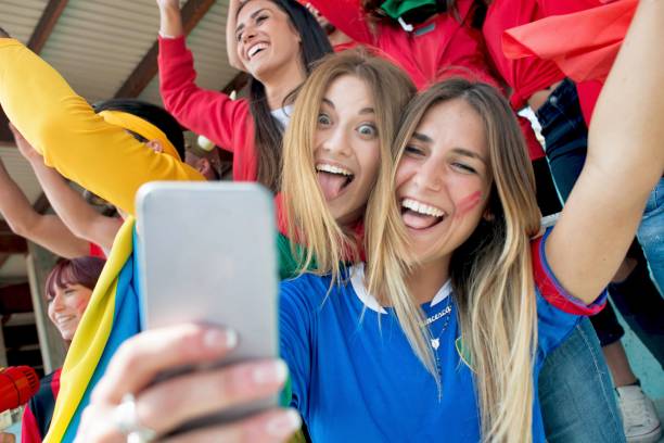 istock Supporter Girls Doing a Selfie 961967168