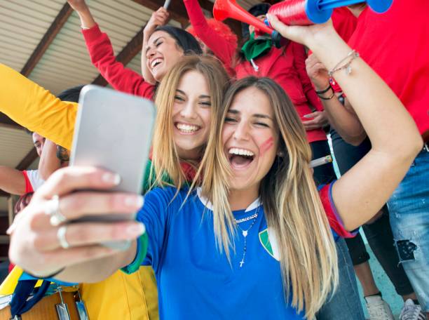 istock Supporter Girls Doing a Selfie 961967340