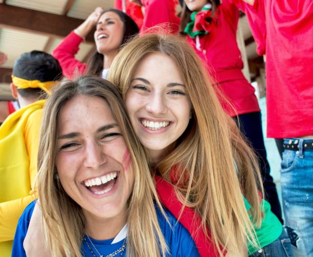 istock Smiling Supporter Girls 961967376