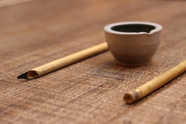 View on bamboo pen and ink bowl for writing Calligraphy Cyrillic Script
