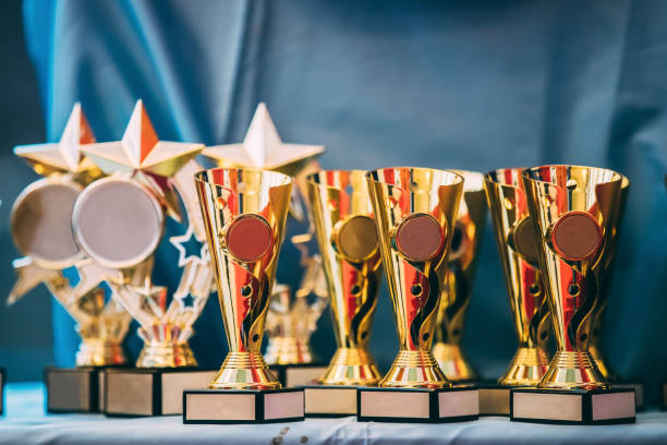 istock Different Champion Golden Trophy, Trophies. Winners Cup 961973526