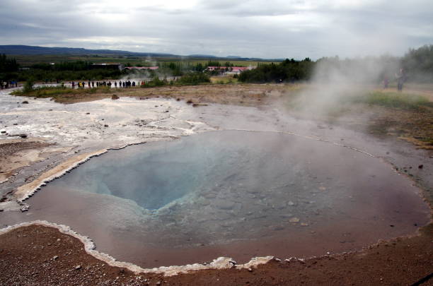 istock Geysir hot water with steam in Iceland 961978218