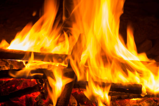 istock burning log and fire in Guatemala. 961981510