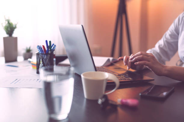 istock Businesswoman typing on a laptop computer 961981836