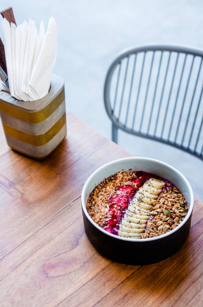 istock Berry smoothie bowl on wooden table 961987466