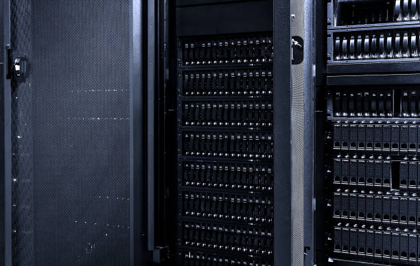 istock Dark server room data center storage with with open door of mainframe 962008686