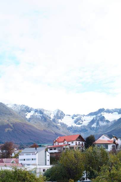 istock Houses with snowy mountains. 962024082