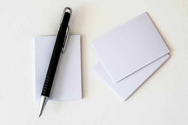 istock stacking of mockup empty white business card with elegance pen  on white paper background , a template for business  branding identity design 962028088