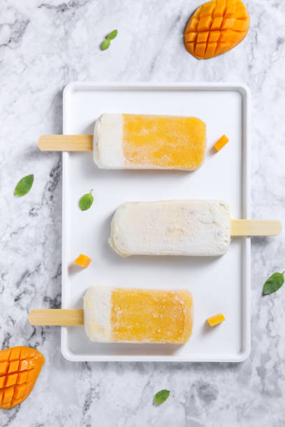 istock homemade ice pops with milk and fruit 962033018
