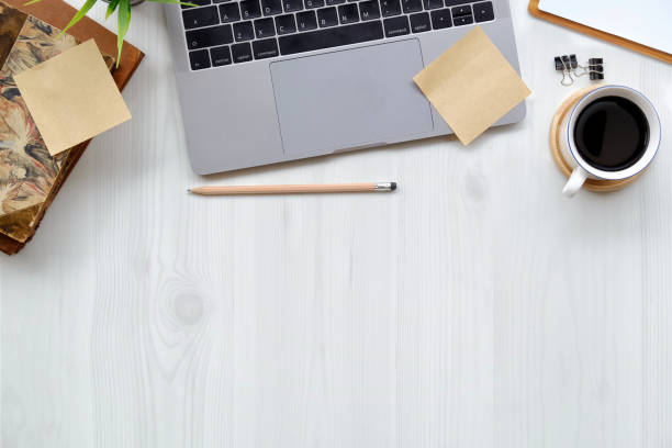 istock Office wooden desk laptop computer, office accessory and copy space. 962036174