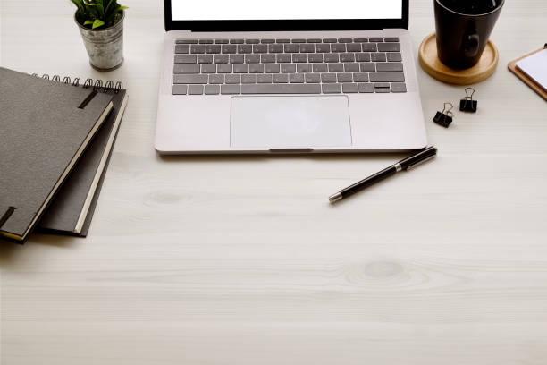 istock Office wooden desk laptop computer, office accessory and copy space. 962036226
