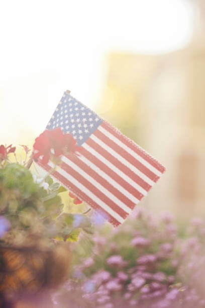 istock Memorial Day background with American flag in sunshine 962046950