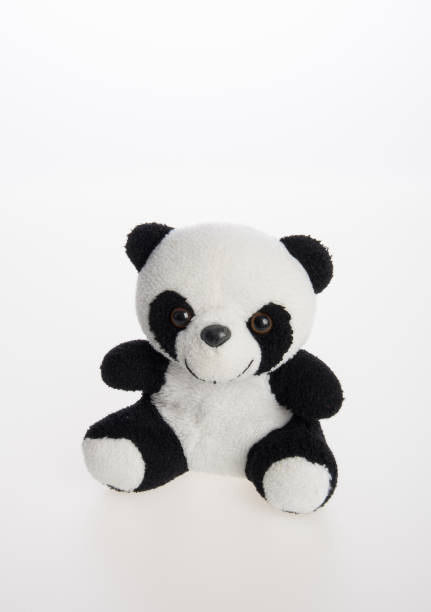 istock toy or panda soft toy on a background 962050490