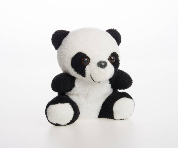 istock toy or panda soft toy on a background 962050628