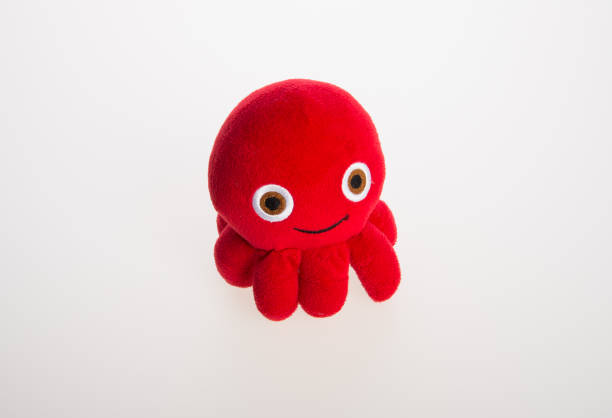istock toy or octopus soft toy on the background 962050992