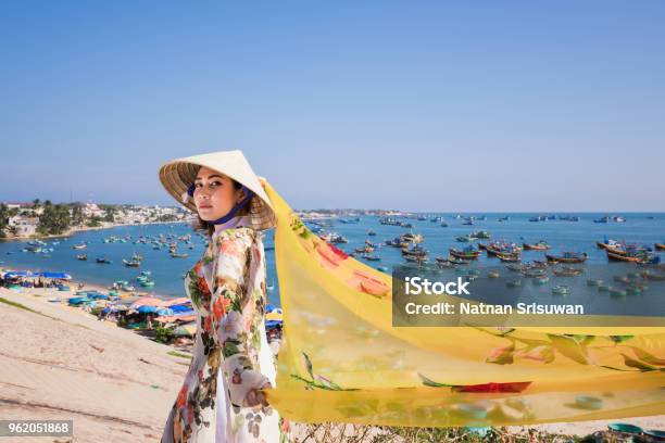 Woman Wearing Ao Dai Culture Traditional Wait At The Harbor Stock Photo - Download Image Now