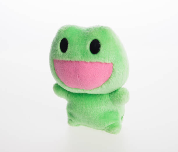 istock toy or frog soft toy on the background 962054558