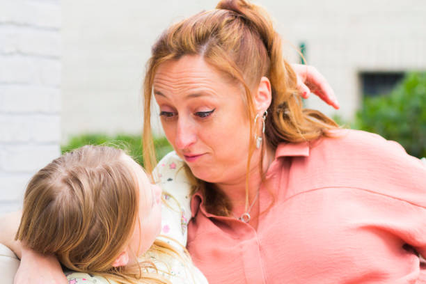 istock Mother and daughter smiling and laughing 962056132