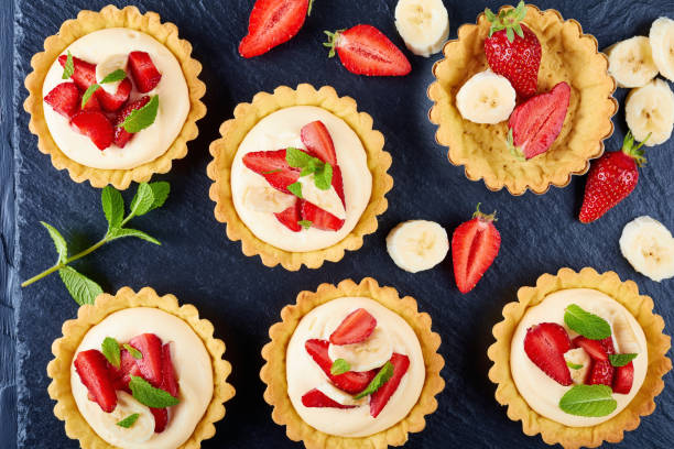 istock tartlets with strawberries, banana slices, mint 962064244