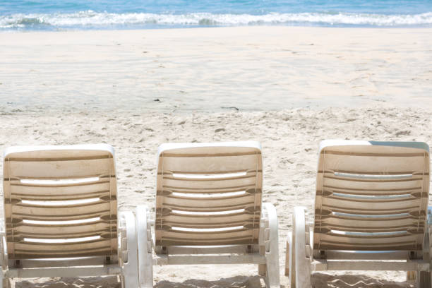 istock Relaxing on the beach chair 962071254