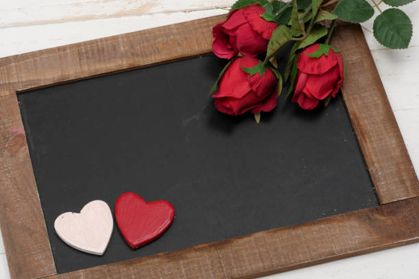 istock a concept romantic, small chalkboard, roses and heart 962075292