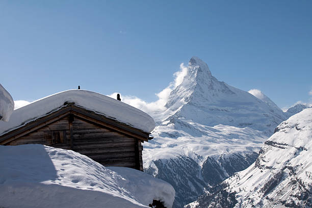 A Swiss chalet with the Matterhorn in Switzerland in the background.