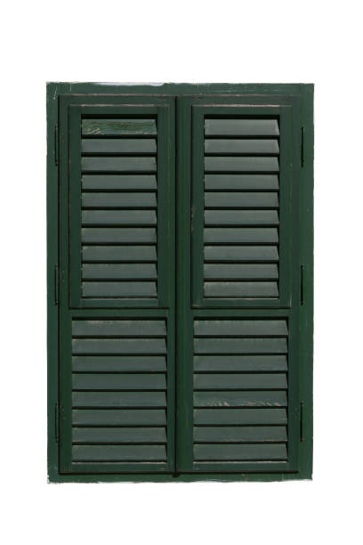 istock Window with green closed shutters isolated on white background. Architecture and exterior details. Path saved. 962076912