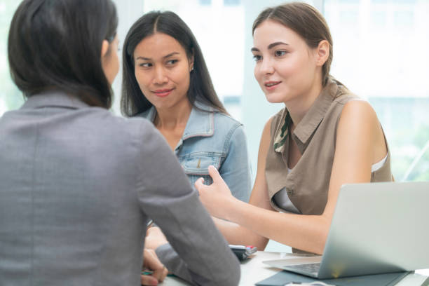 istock Multicultural businesswomen in group meeting. 962081140