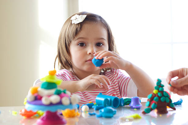 istock Girl playing with play dough 96208276