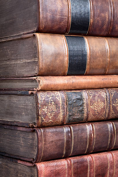 istock Pile of old leather bound books 96208439