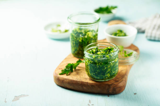 Pesto sauce Homemade pesto sauce in the jars wild garlic leaves stock pictures, royalty-free photos & images