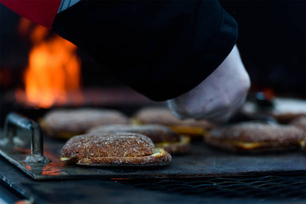 istock Grilling bread, cheese and meat in an outdoor grill 962091108