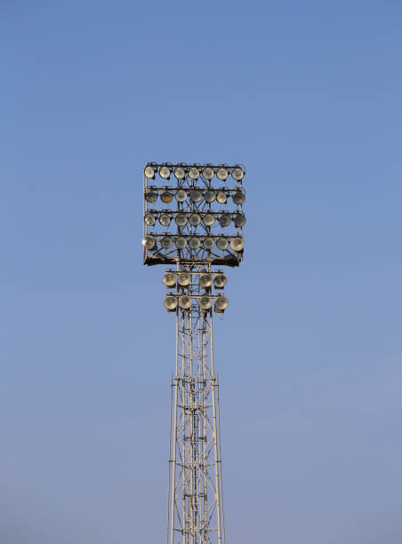 istock big light tower of an unlit stadium 962094326