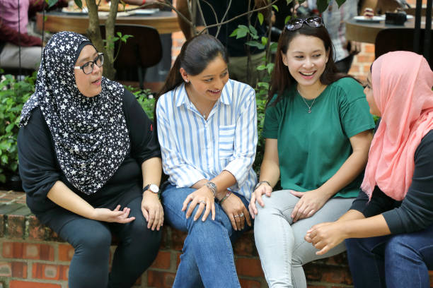istock Group of young Asian woman talking chatting 962100772