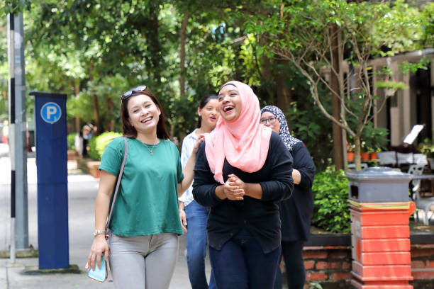 istock Group of young Asian woman walking talking 962101154