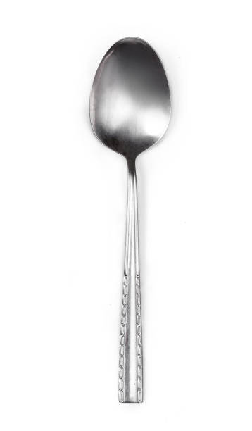 Steel tablespoon. Dinning silver spoon isolated on white background. Kitchen utensils concept, close up"n Steel tablespoon. Dinning silver spoon isolated on white background. Kitchen utensils concept, close up"n baby spoon stock pictures, royalty-free photos & images