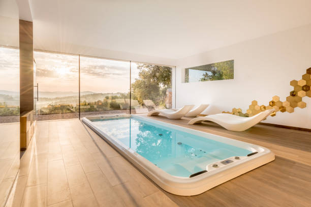 Spa with whirlpool and sauna Spa with whirlpool and sauna with beautiful sunrise views spa room stock pictures, royalty-free photos & images