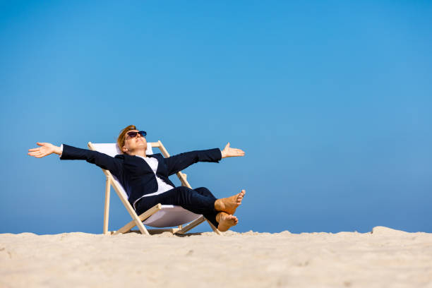 istock Woman relaxing on beach 962112172