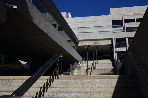 Example of a stainless steel railing along an exterior set of stairs at a public, commercial building..