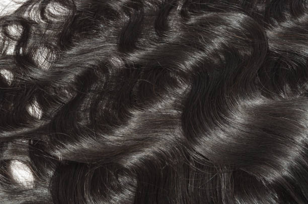 istock unfolded virgin remy body wavy black human hair weave extensions 962113926